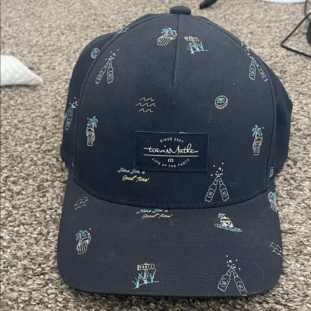 Travis Mathew Navy Hat with Light Blue and White Accents